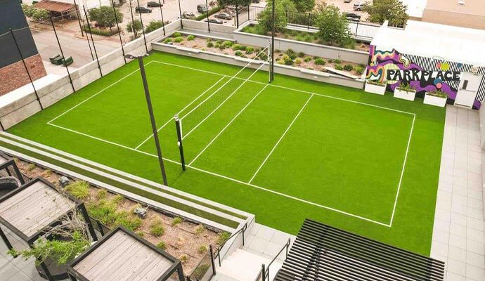Artificial turf for tennis court Installed artificial turf for tennis courts near park area