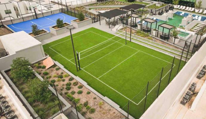 Installed artificial turf in backyards Installed turf in tennis court