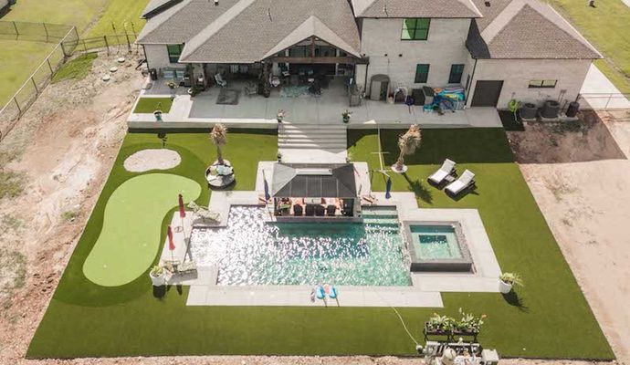 Installed synthetic grass around pool area Installed synthetic grass around pool area in front of home