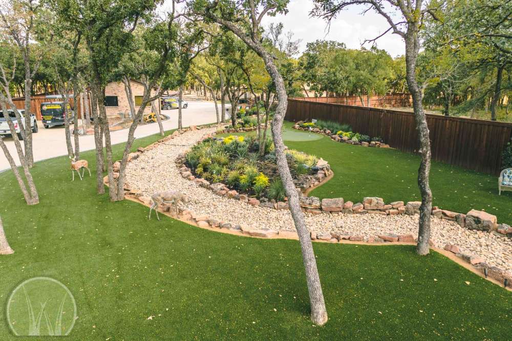 beautiful garden with care and maintain artificial grass.