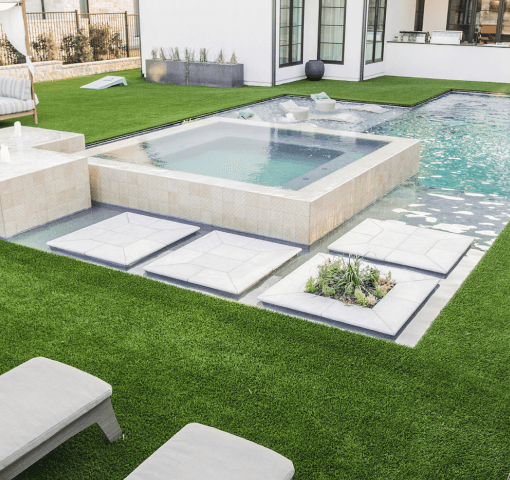 beautiful pool, decking strip, and artificial grass at your garden.