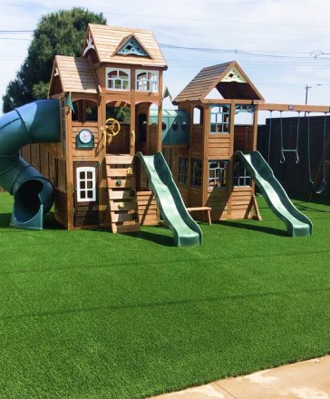 wooden playground with slides